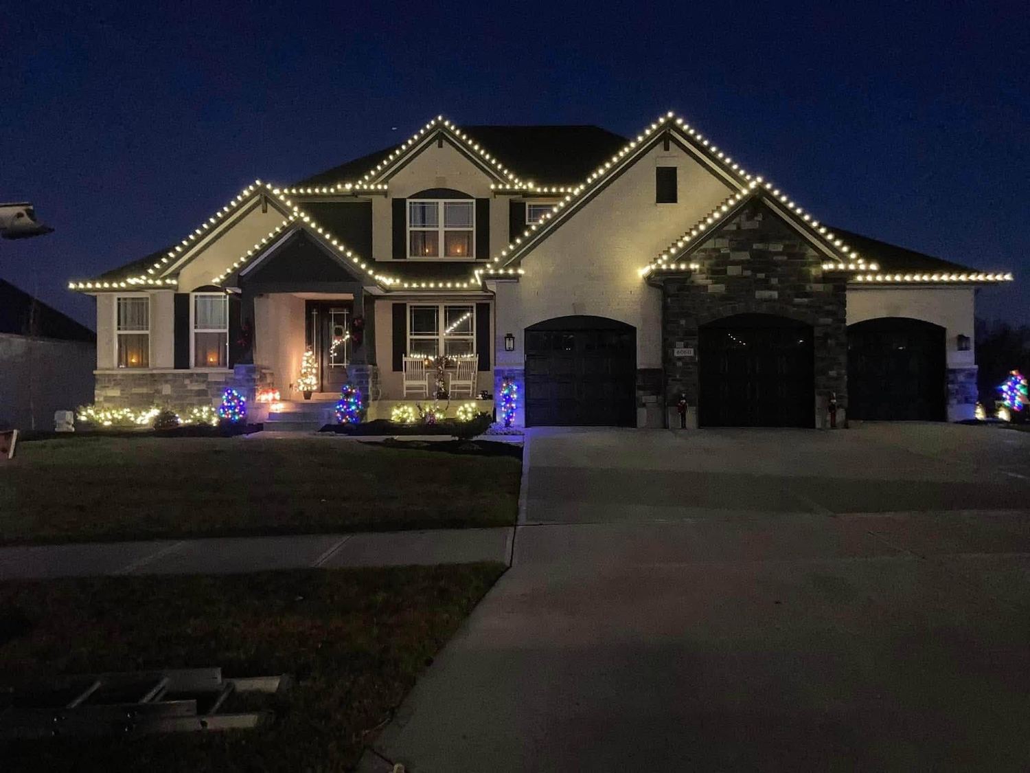 Three-car frontage, one clean line &mdash; Christmas light installation in Greater Cincinnati by Mike&rsquo;s Cincinnati Christmas Lights