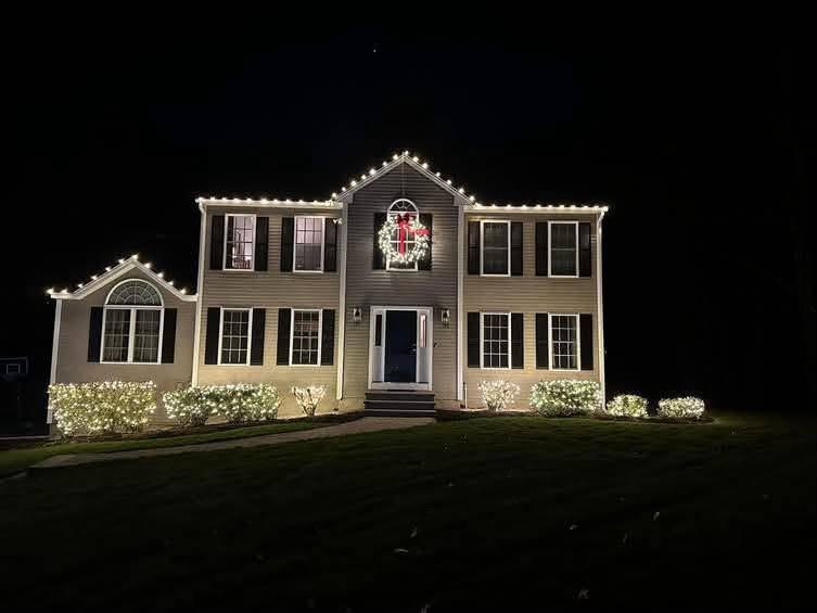Wreath centered, windows framed — Christmas light installation by Mike’s Cincinnati Christmas Lights