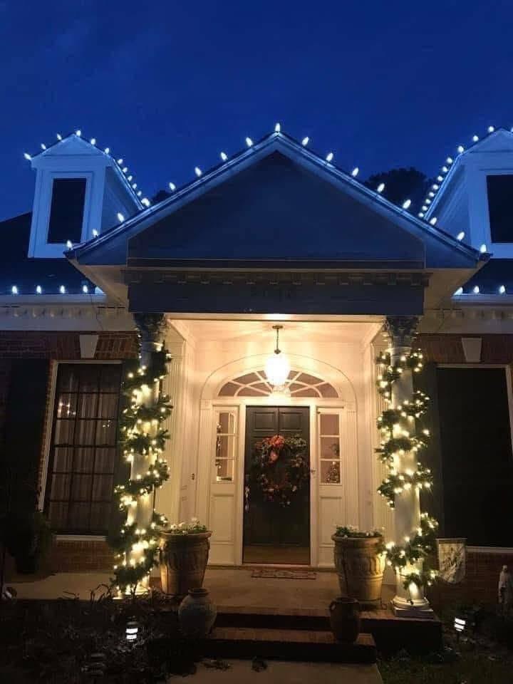 Wreath and wrapped columns at the door &mdash; Christmas light installation in Greater Cincinnati by Mike&rsquo;s Cincinnati Christmas Lights